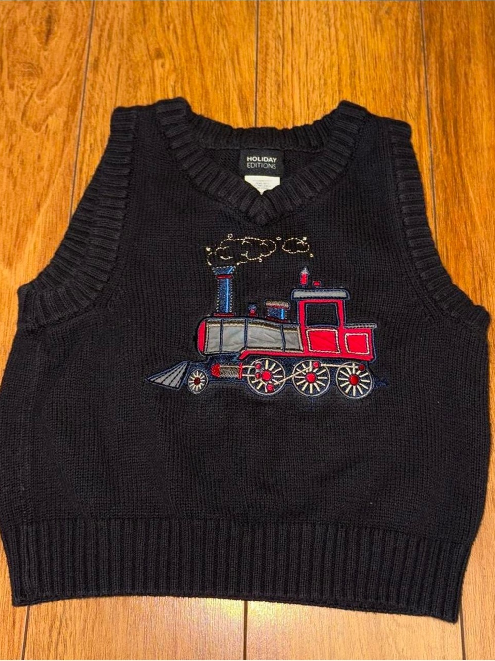 Vintage train sweater vest with red accents